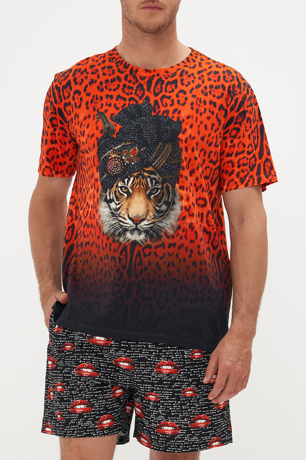 Detail view of model wearing Hotel Franks by CAMILLA mens relaxed fit tee in Chaos Magic graphic print