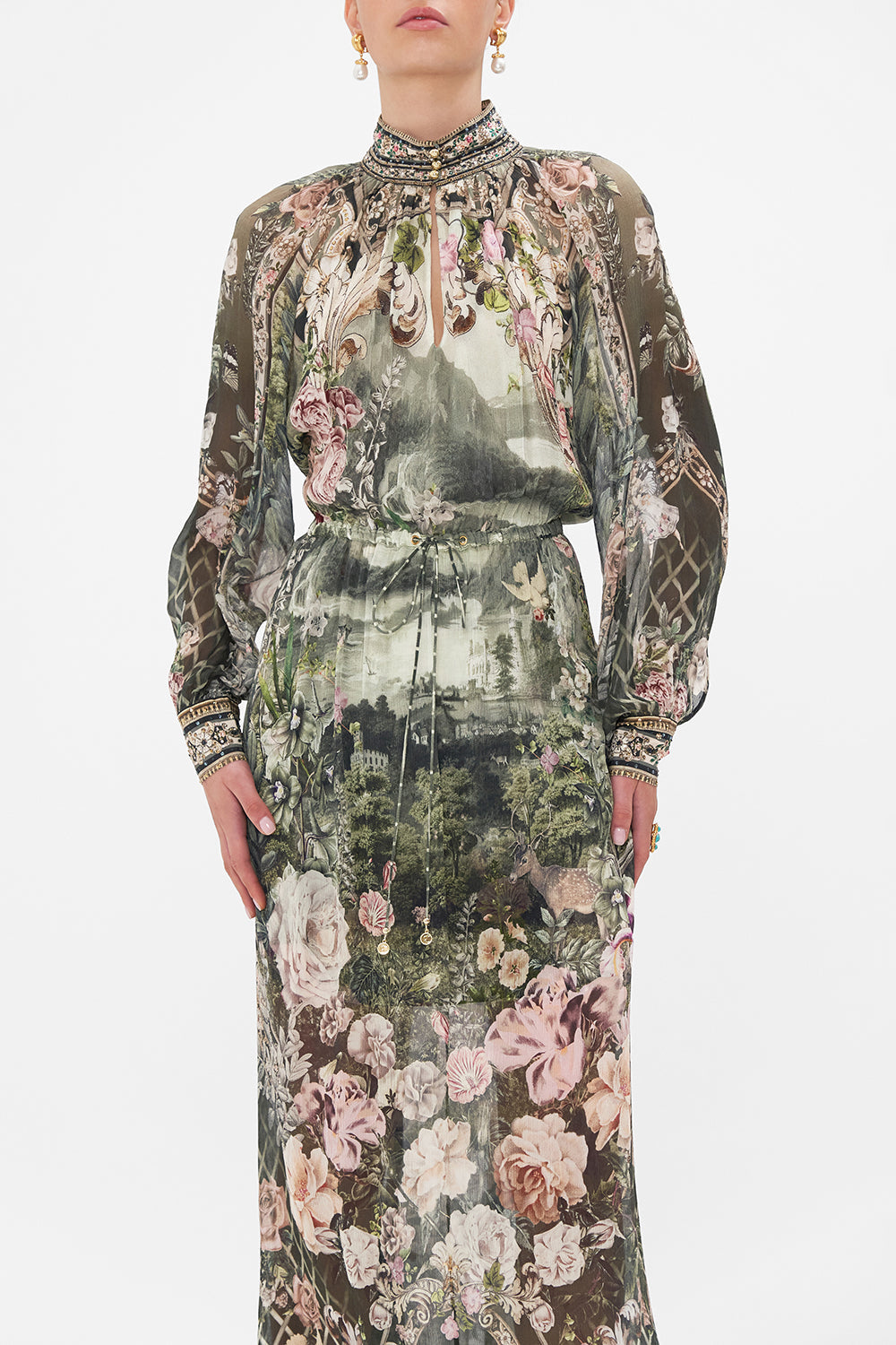 Crop view of model wearing CAMILLA green silk floral maxi dress in Garden Of Good Fortune print