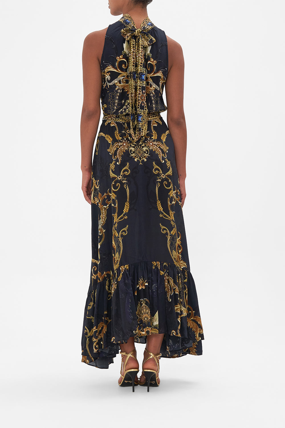 Back view of model wearing CAMILLA silk maxi dress in Moonlight Melodies print