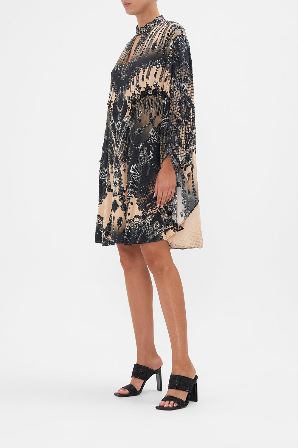 Side view of model wearing CAMILLA silk kaftan in Curtain Call Chaos print