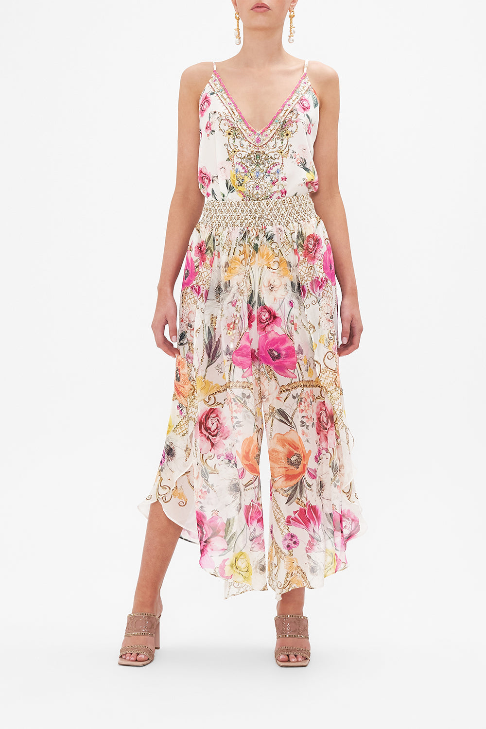 Front view of model wearing CAMILLA floral silk pants in Destiny Calling print