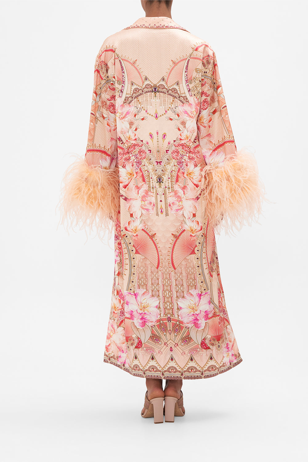 Back view of model wearing CAMILLA silk robe with feathers in Adore Me pink floral print
