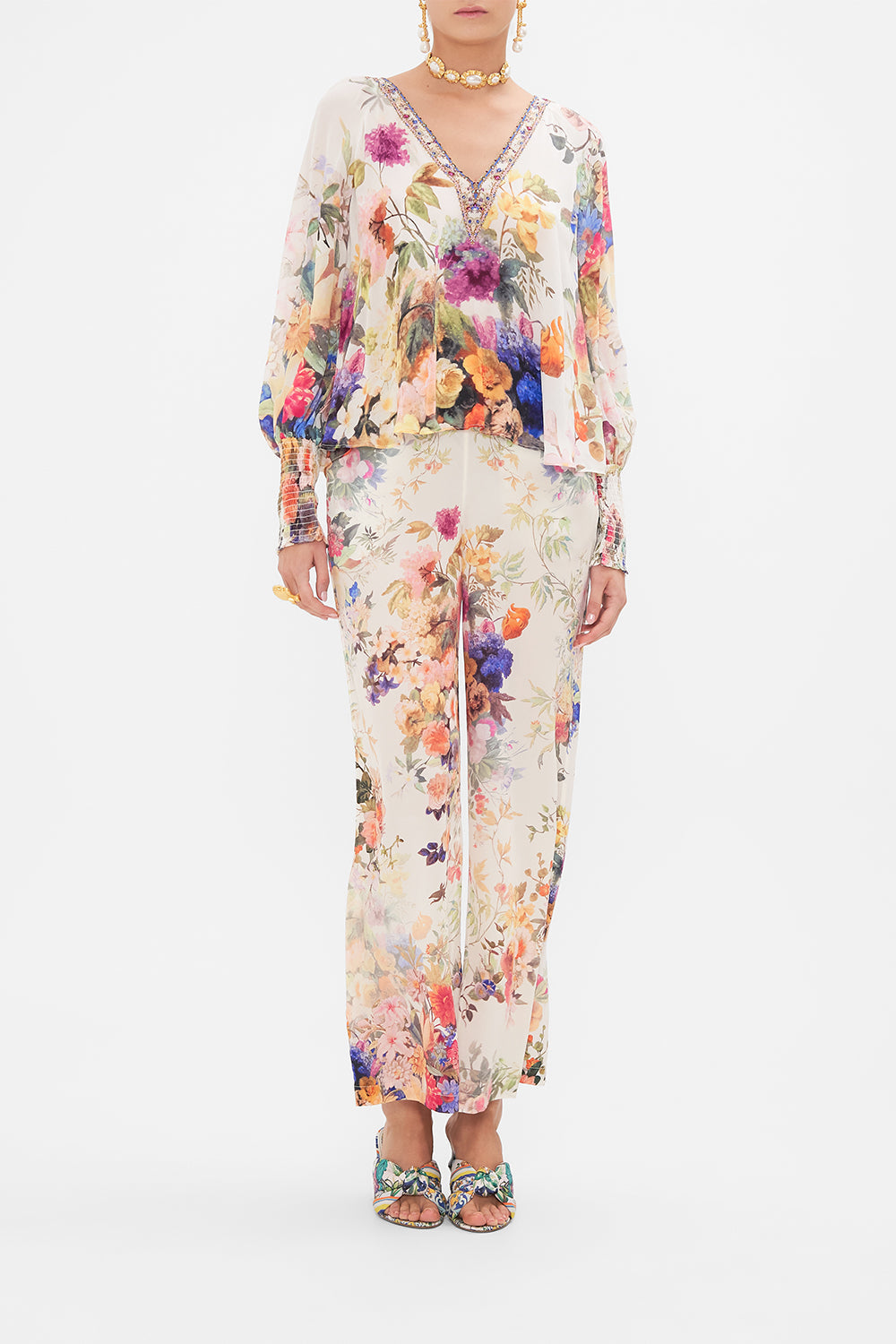 Front view of model wearing CAMILLA silk blouse in Friends with Frescos print