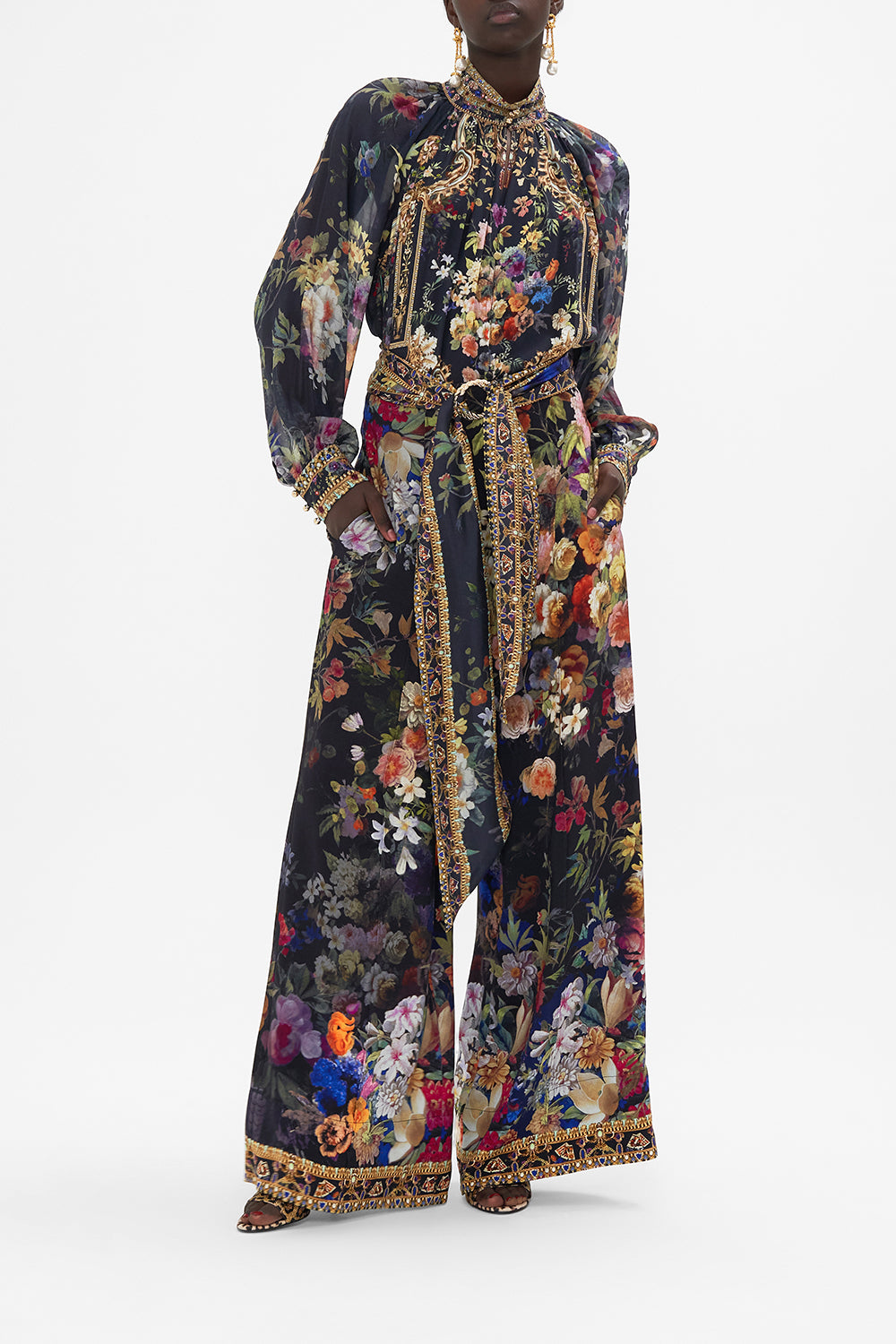 Front view of model wearing CAMILLA wide leg pants in Play Your Cards Right print