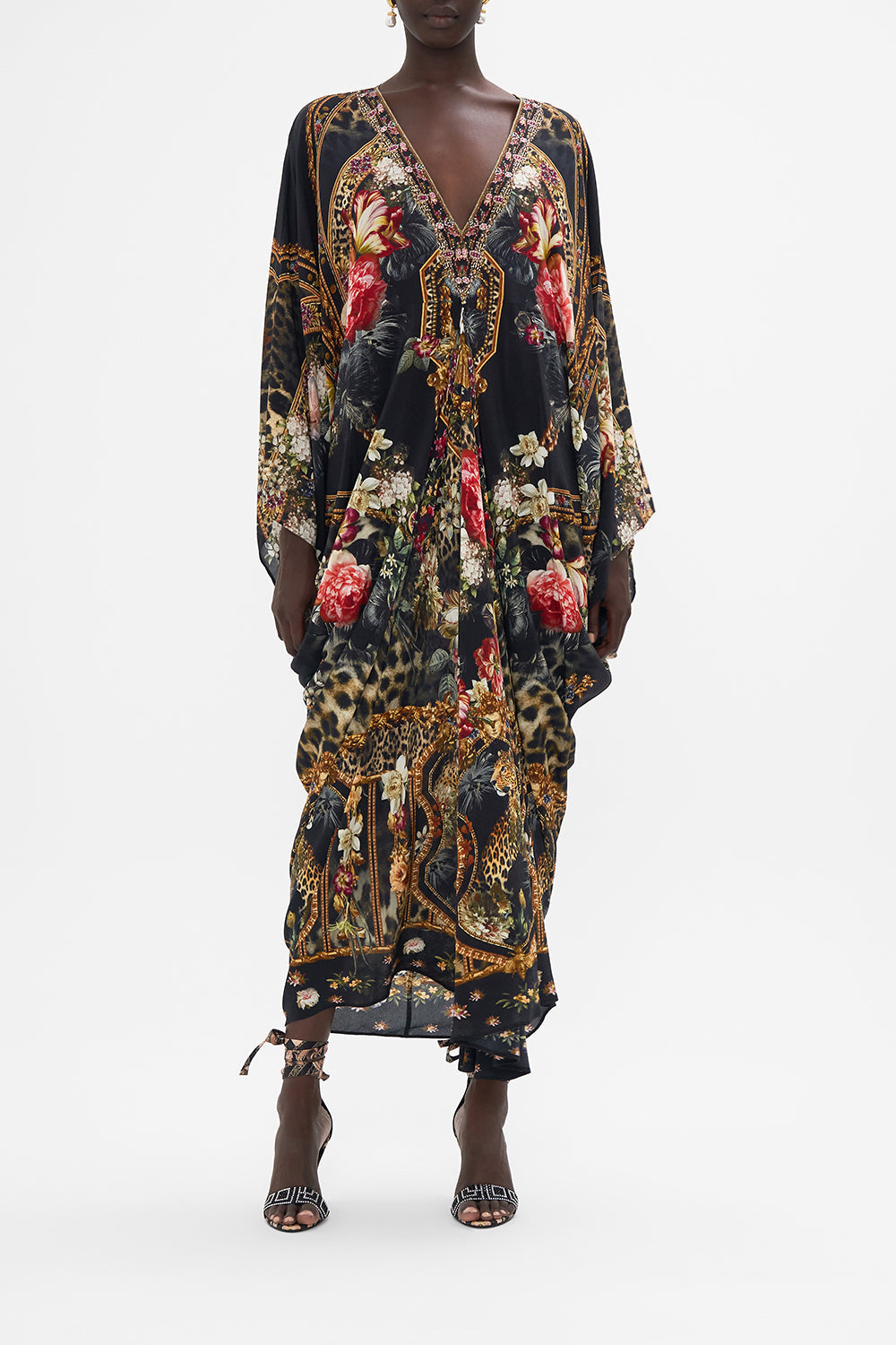 Front view of model wearing CAMILLA floral print long silk kaftan in A Night At The Opera print