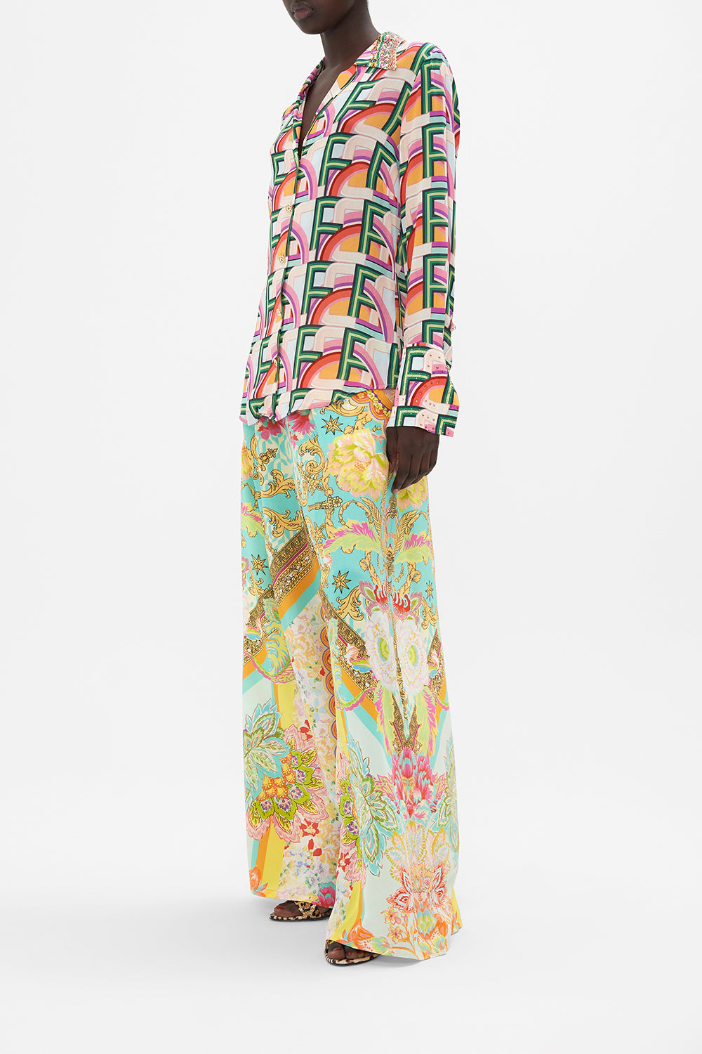 Side view of model wearing CAMILLA printed silk shirt in An Italian Welcome print