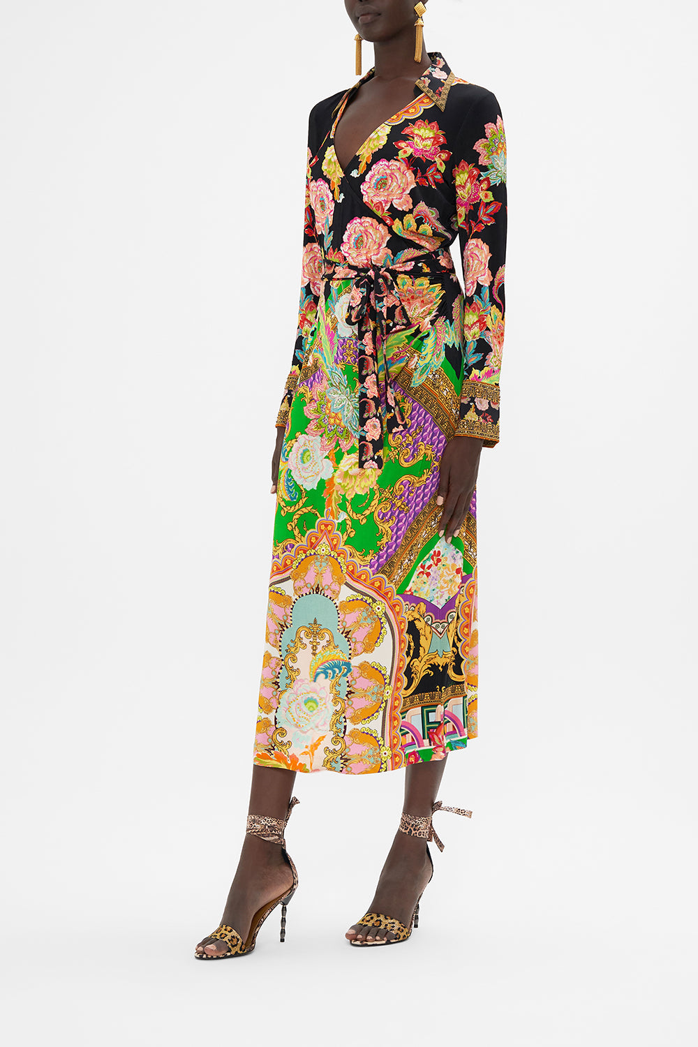 Side view of model wearing CAMILLA printed jersey wrap dress in Sundowners In Sicily print