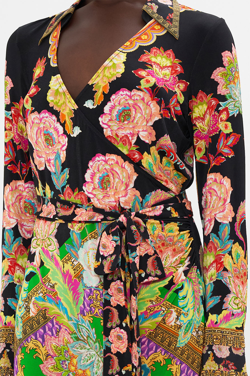 Detail view of model wearing CAMILLA printed jersey wrap dress in Sundowners In Sicily print