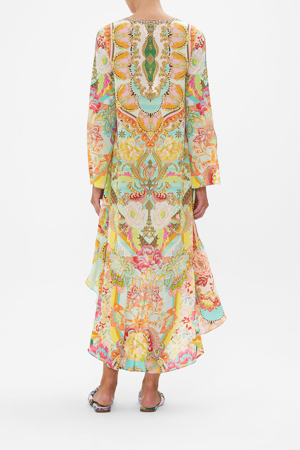 Back view of model wearing CAMILLA silk mini dress with high low hem in An Italian Welcome print