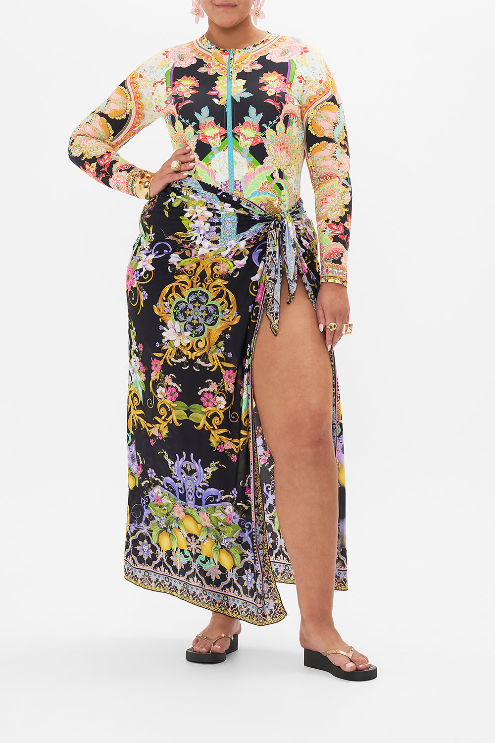 Front view of curvy model wearing CAMILLA plus size paddle suit in Sundowners in Sicily print