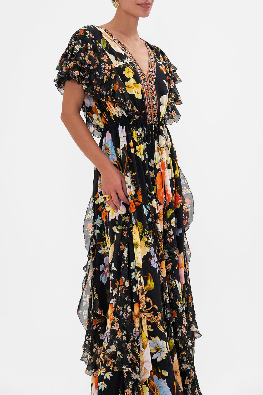 Crop view of model wearing CAMILLA silk ruffle maxi dress in Secret History floral print