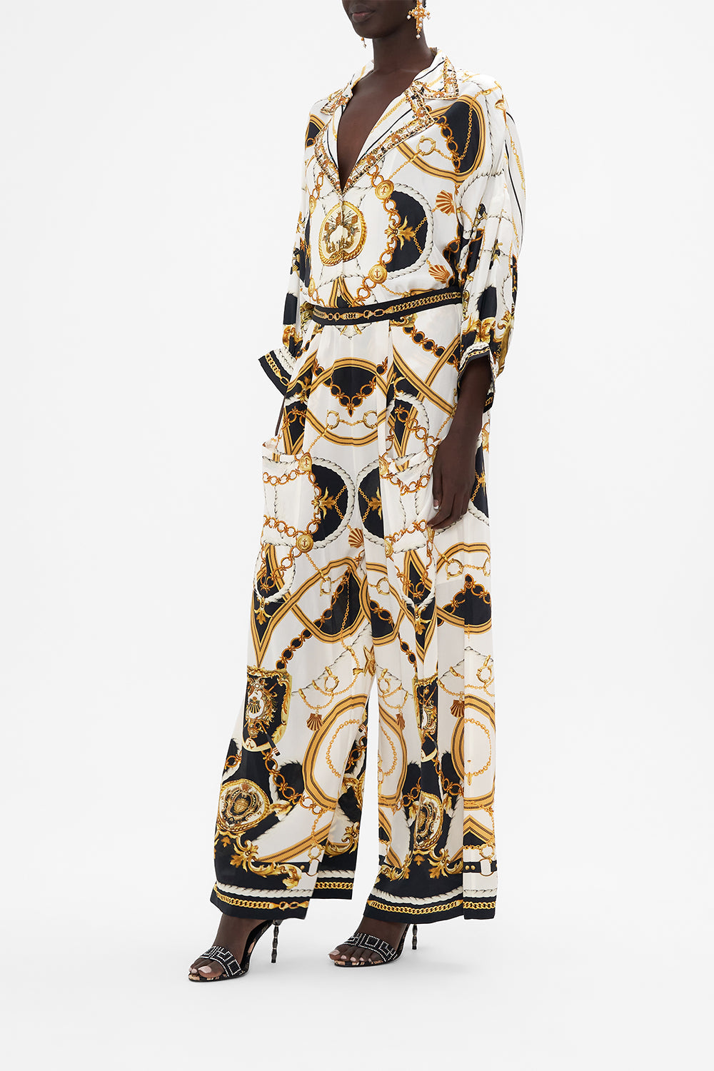 Crop view of model wearing CAMILLA silk shirt in Sea Charm print