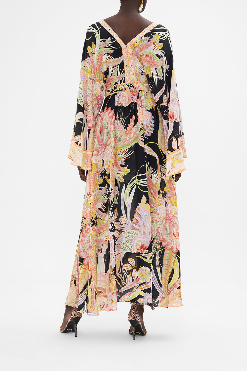 Back view of model wearing CAMILLA designer silk dress in Lady Of The Moon print