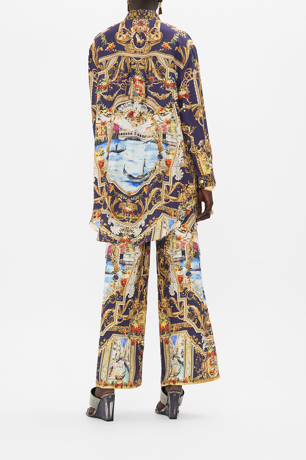 Back view of model wearing CAMILLA floral shirt tunic in Flowers Of Neptune print