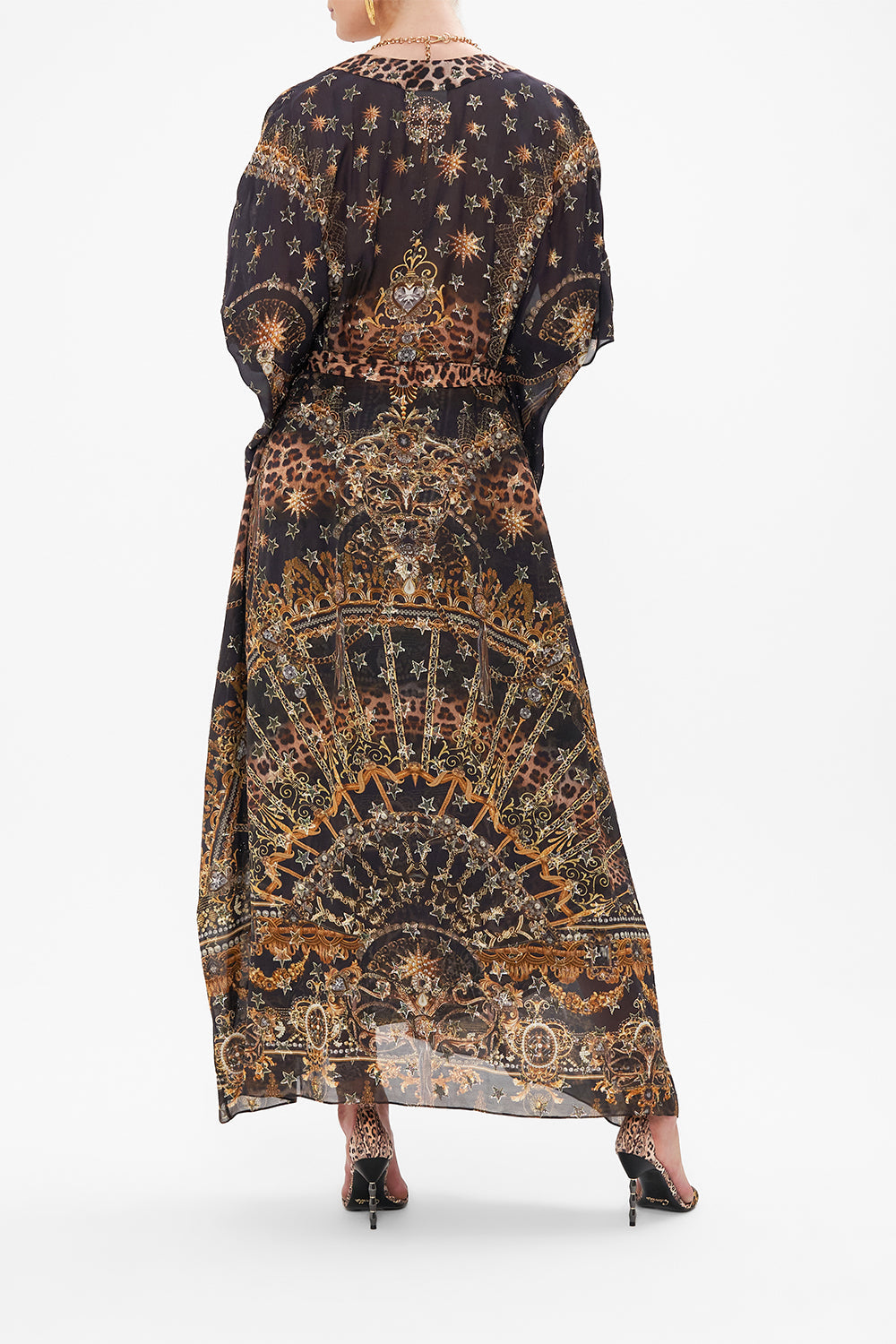 Back view of model wearing CAMILLA lurex outerwear layer in Masked Moonlight print