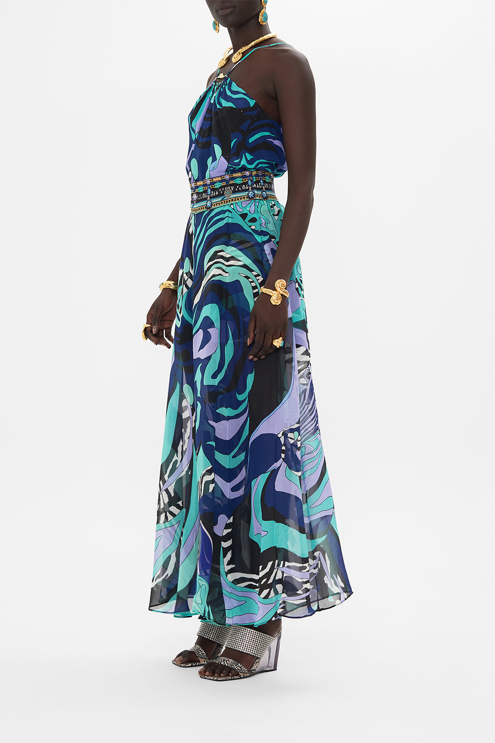 Side view of model wearing CAMILLA sheer silk palazzo pants in Vividly Venice print