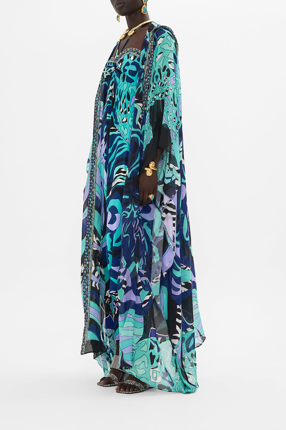 Side view of model wearing CAMILLA silk robe in Vividly Venice print