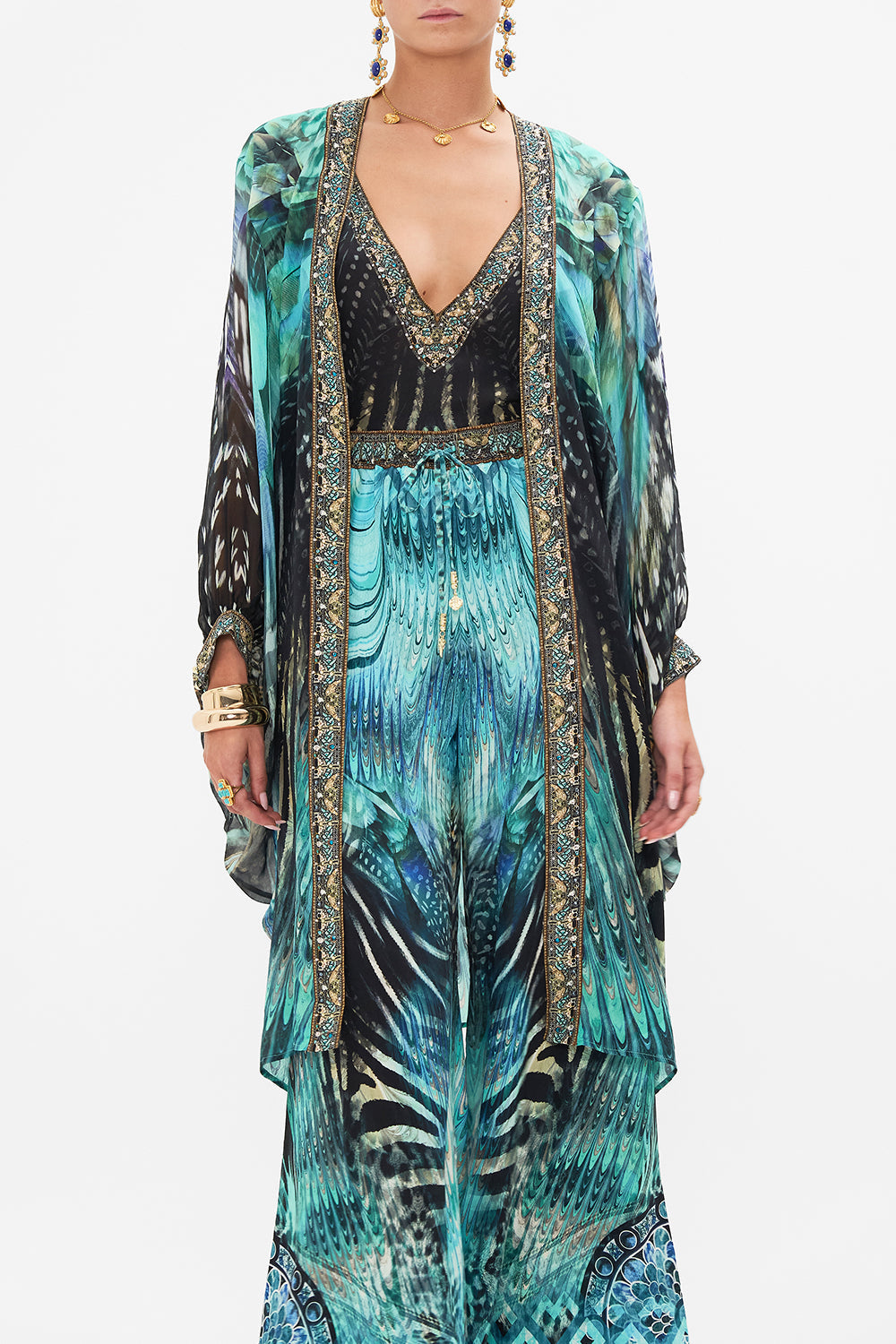Crop view of model wearing CAMILLA silk kimono layer in Azure Allure print