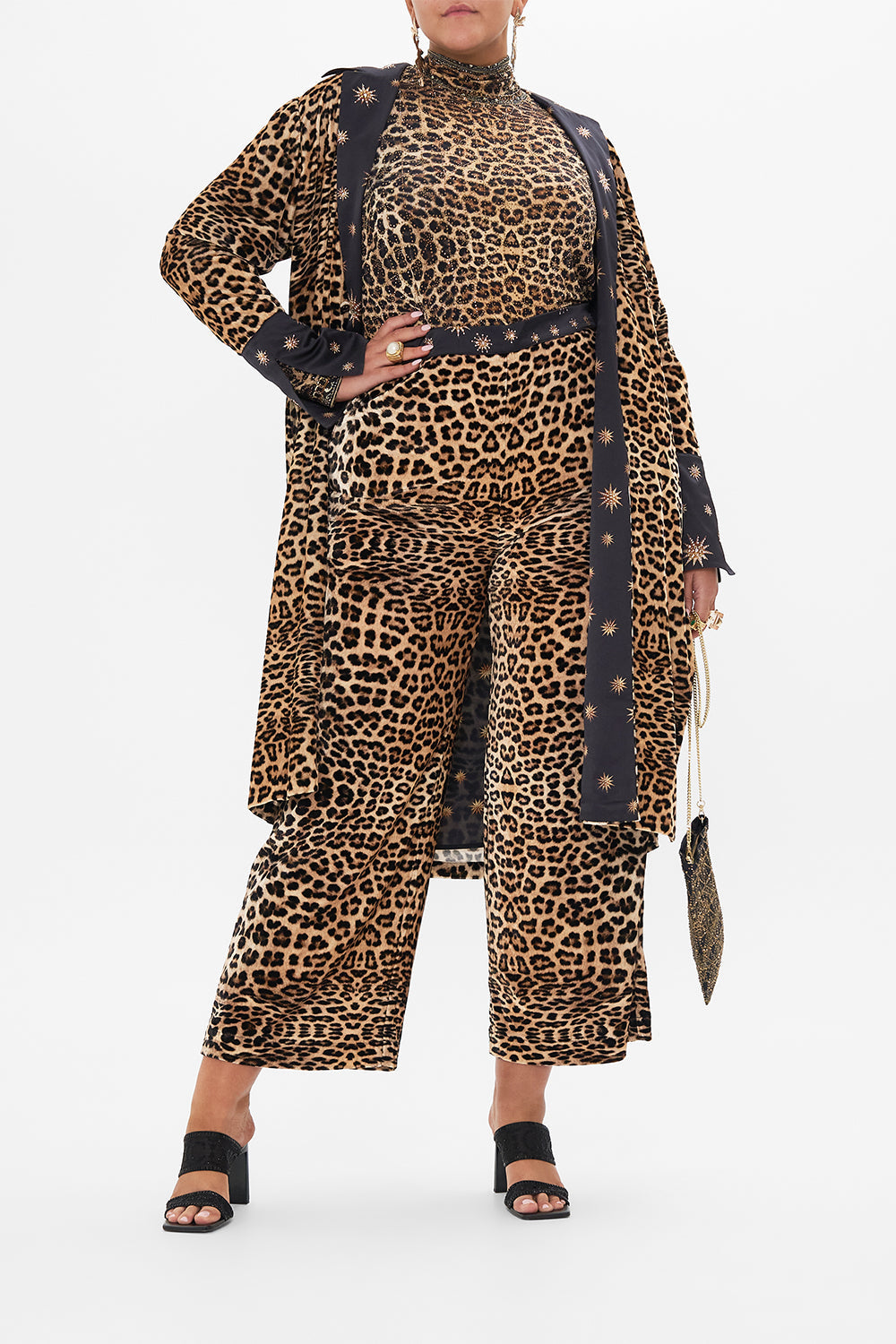 front view of curvy model wearing CAMILLA plus size turtleneck top in Soul Of A Star Gazer print