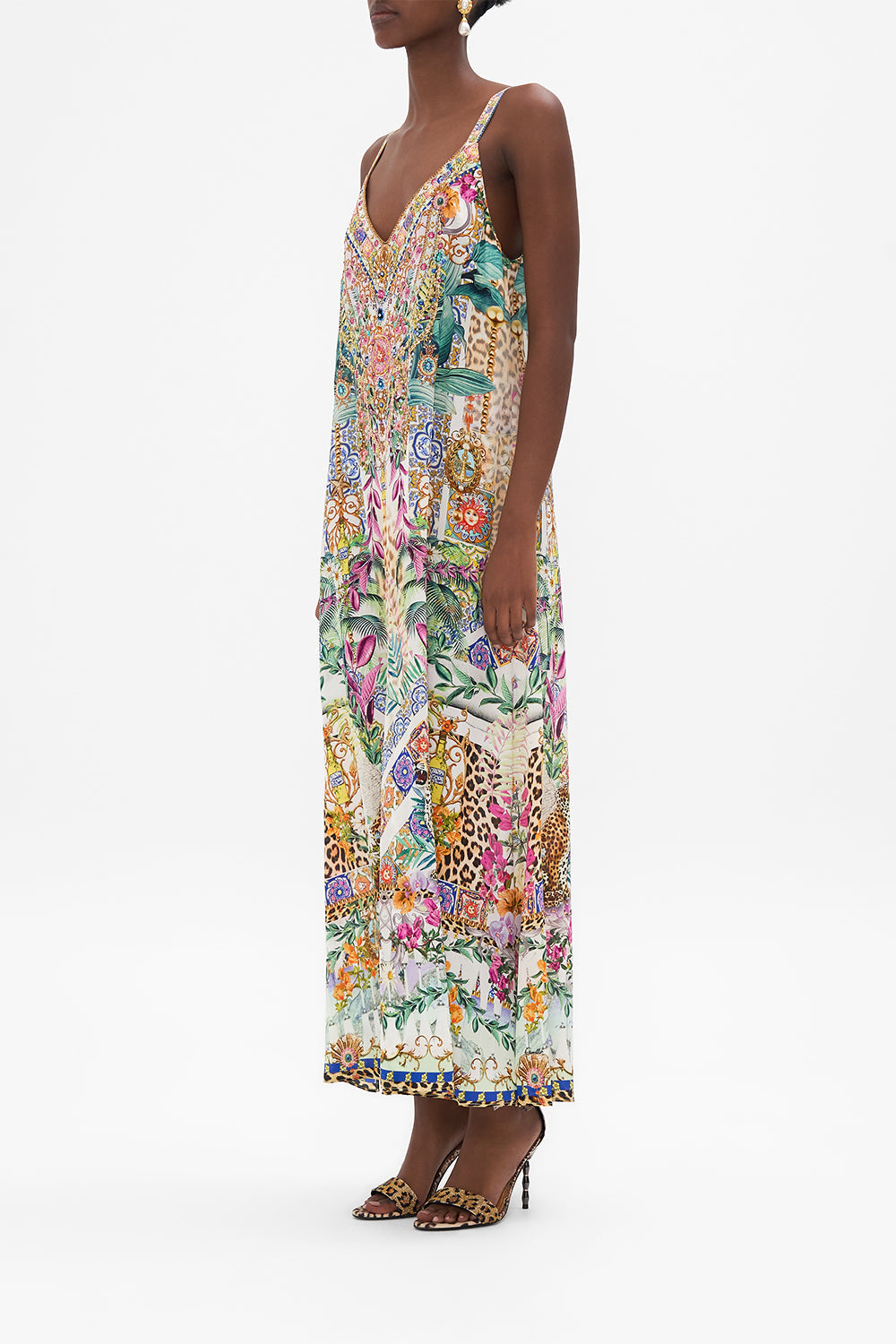 Side view of model wearing CAMILLA floral silk slip dress in Flowers Of Neptune print
