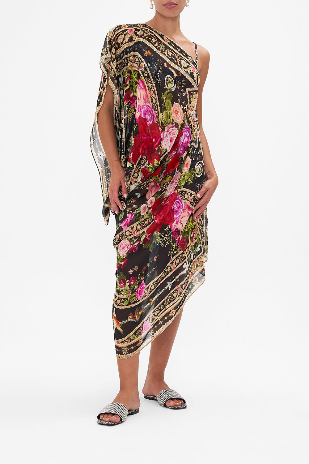 Detail view of model wearing CAMILLA floral silk shrug in Reservation for Love print