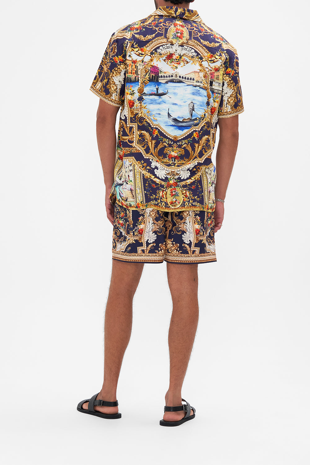 Back view of model wearing Hotel Franks By CAMILLA mens short sleeve camp collared shirt in Venice Vignette print