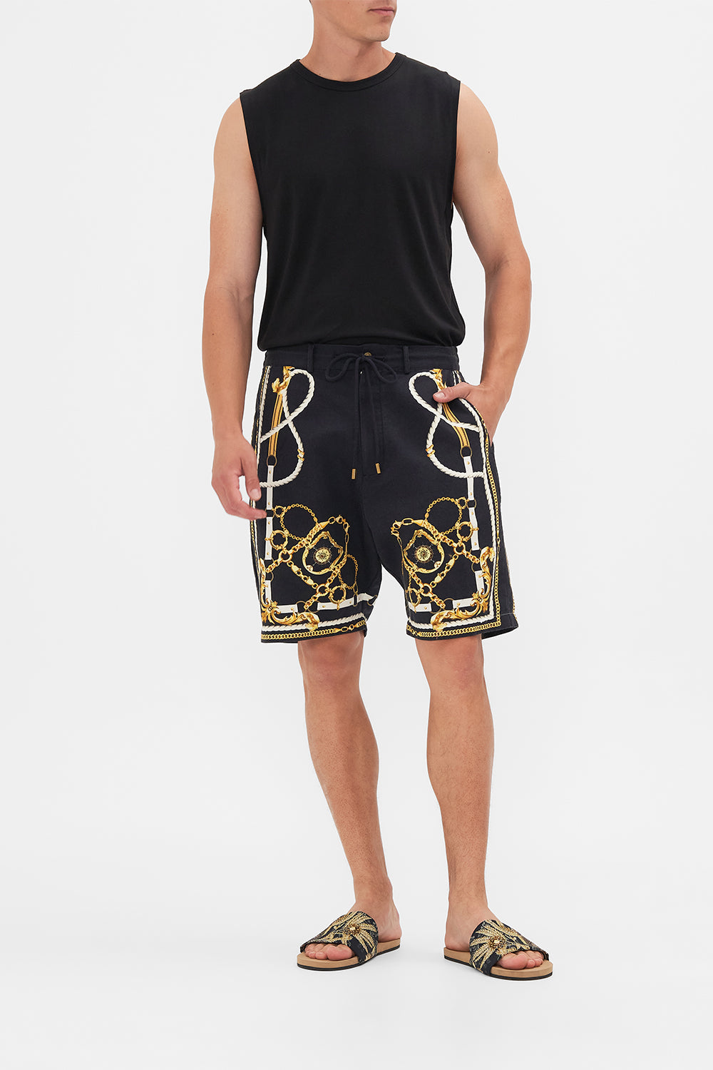 Front view of model wearing Hotel Franks By CAMILLA mens boardshort in Coast To Coast print