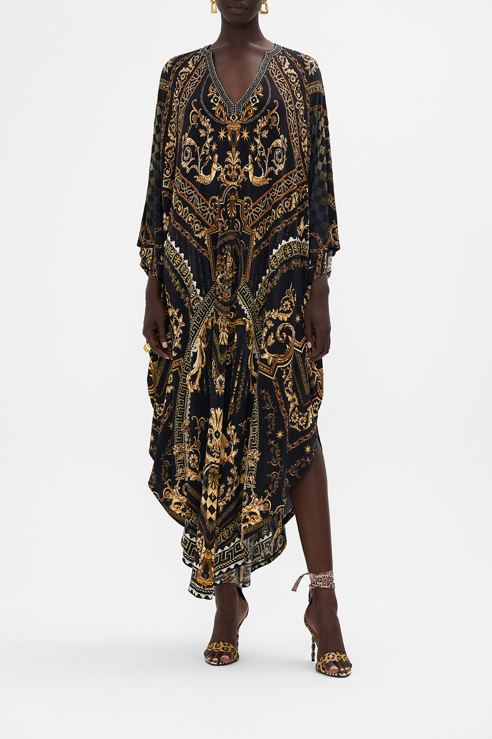 Front view of model wearing CAMILLA black and gold silk kaftan in Duomo Dynasty