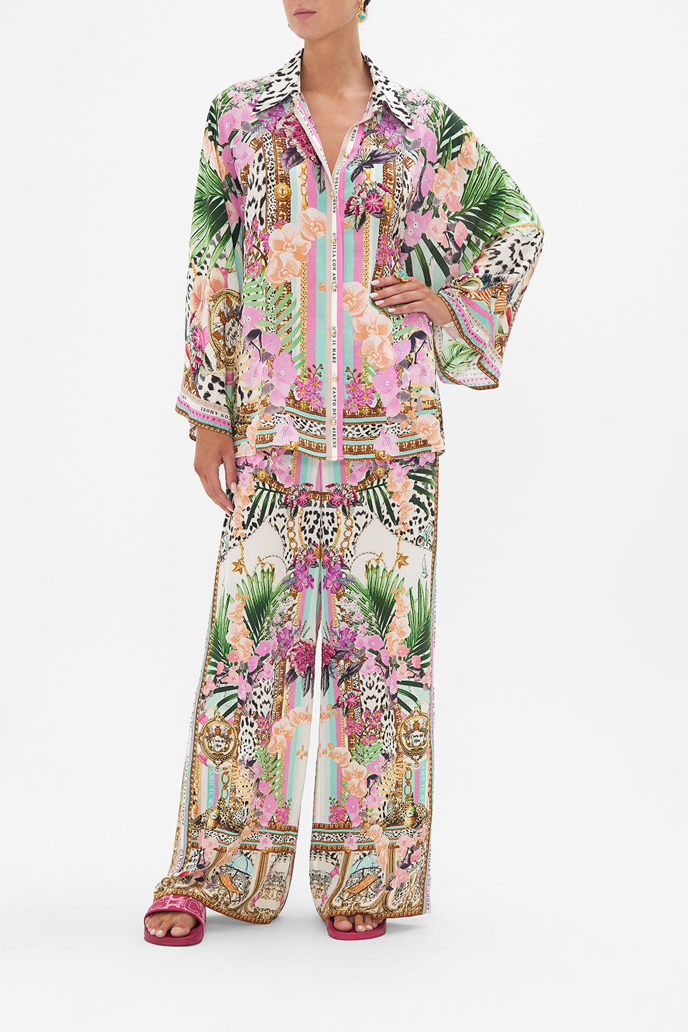 Front view of model wearing CAMILLA silk wide sleeve blouse in Dear Amore Mio print