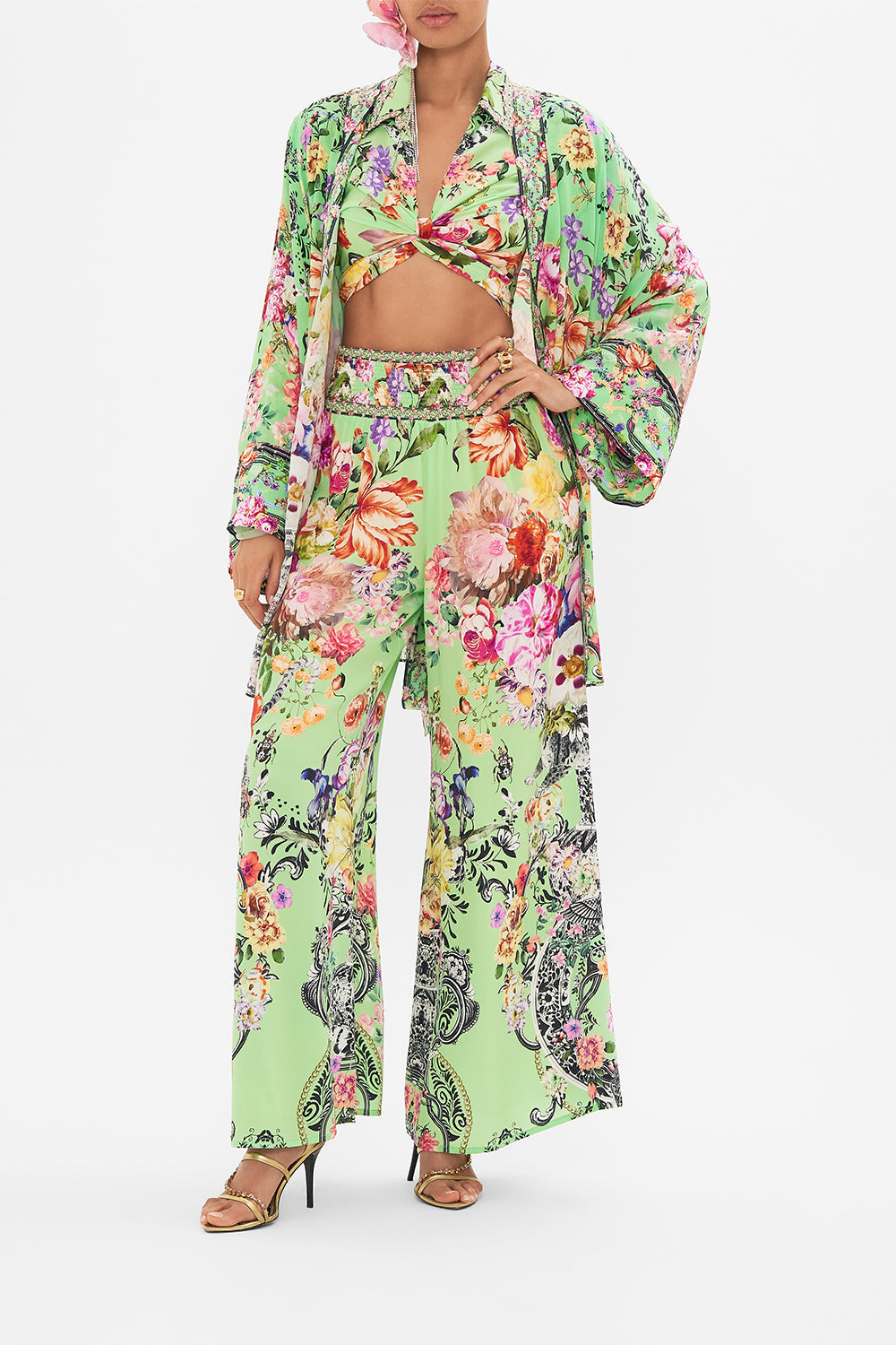 Crop view of model wearing CAMILLA silk shirt dress in Delft Dynasty print