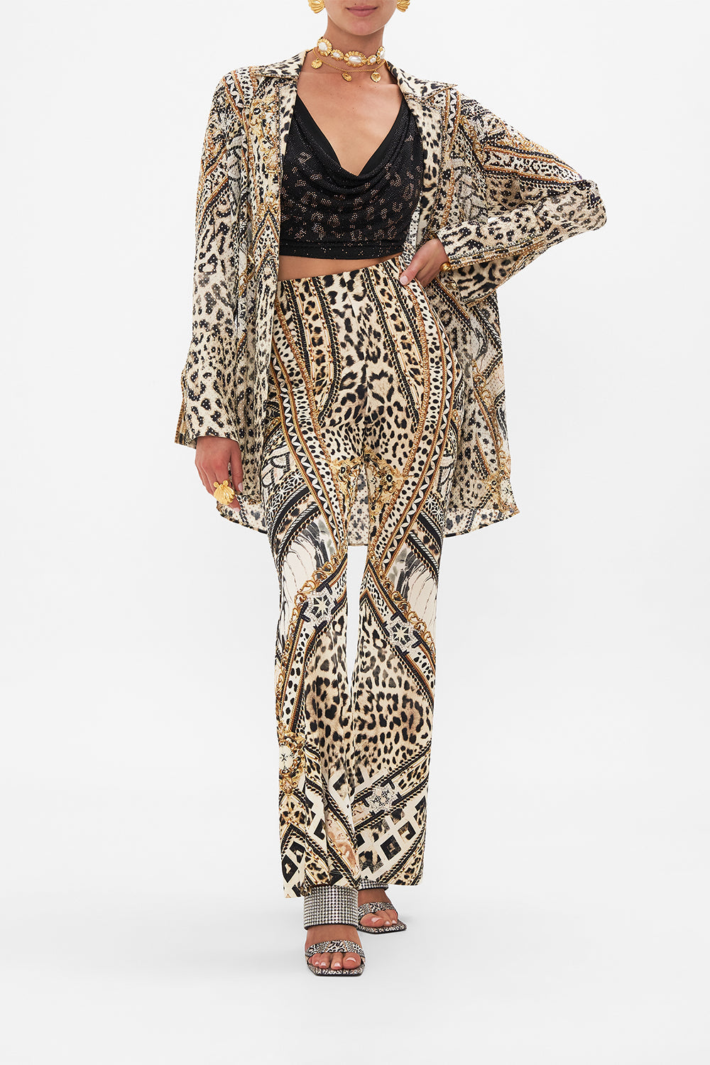 Style view of model wearing CAMILLA black halter top in Mosaic Muse