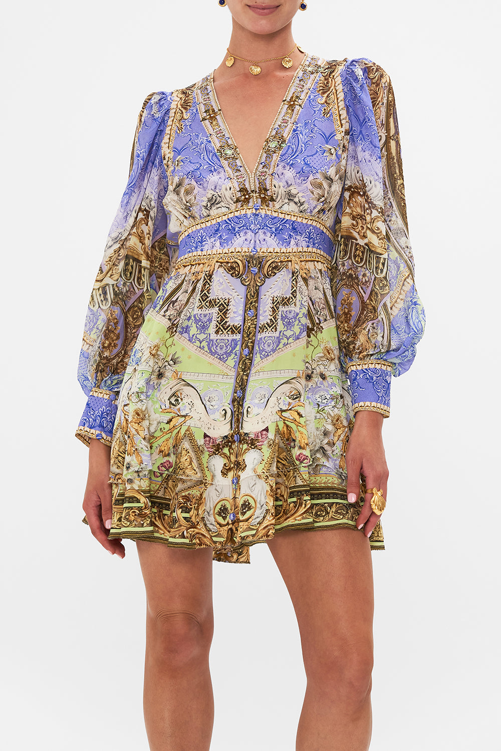 Crop view of model wearing CAMILLA silk frill drfess in Guilded Pleasures print