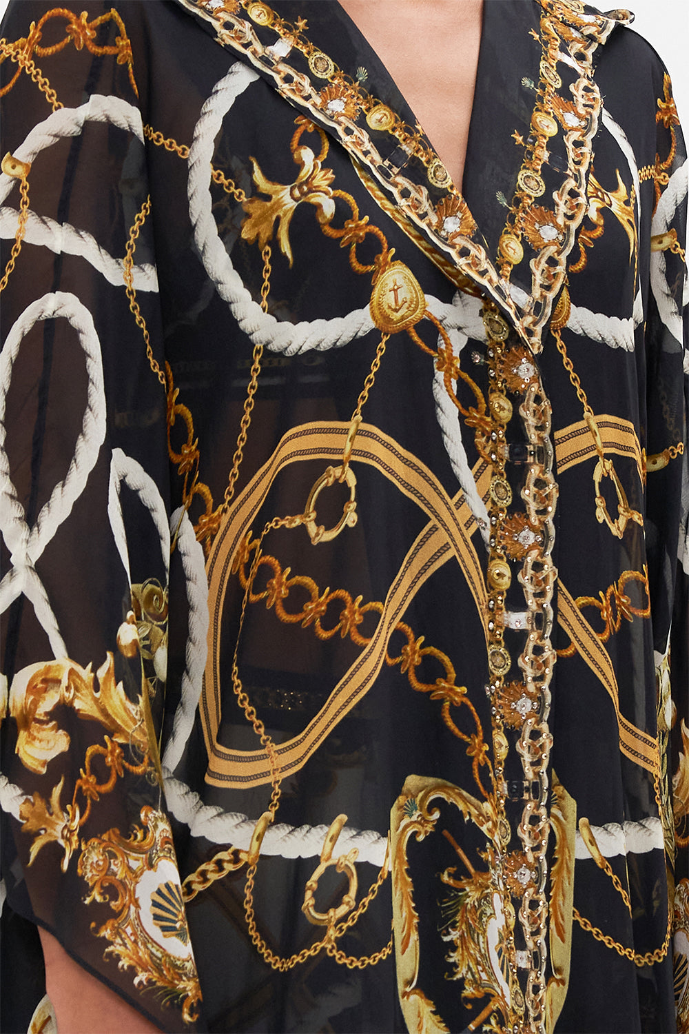 Detail view of model wearing CAMILLA silk robe in Coast To Coast print