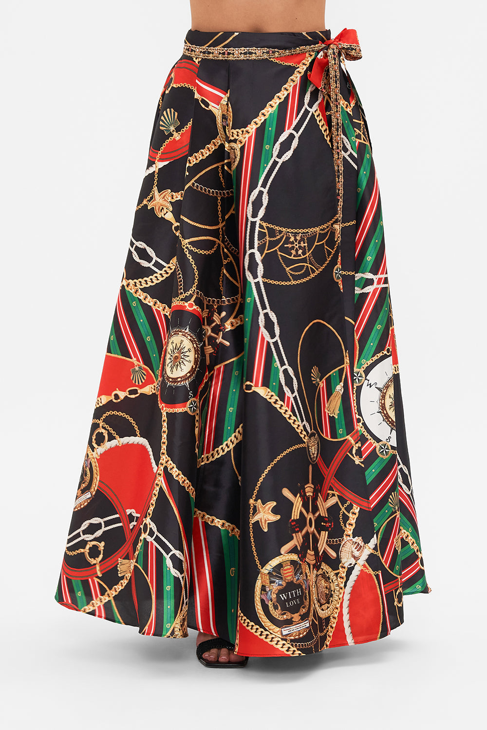 Crop view of model wearing CAMILLA designer flared pants in Soul of A Stargazer print