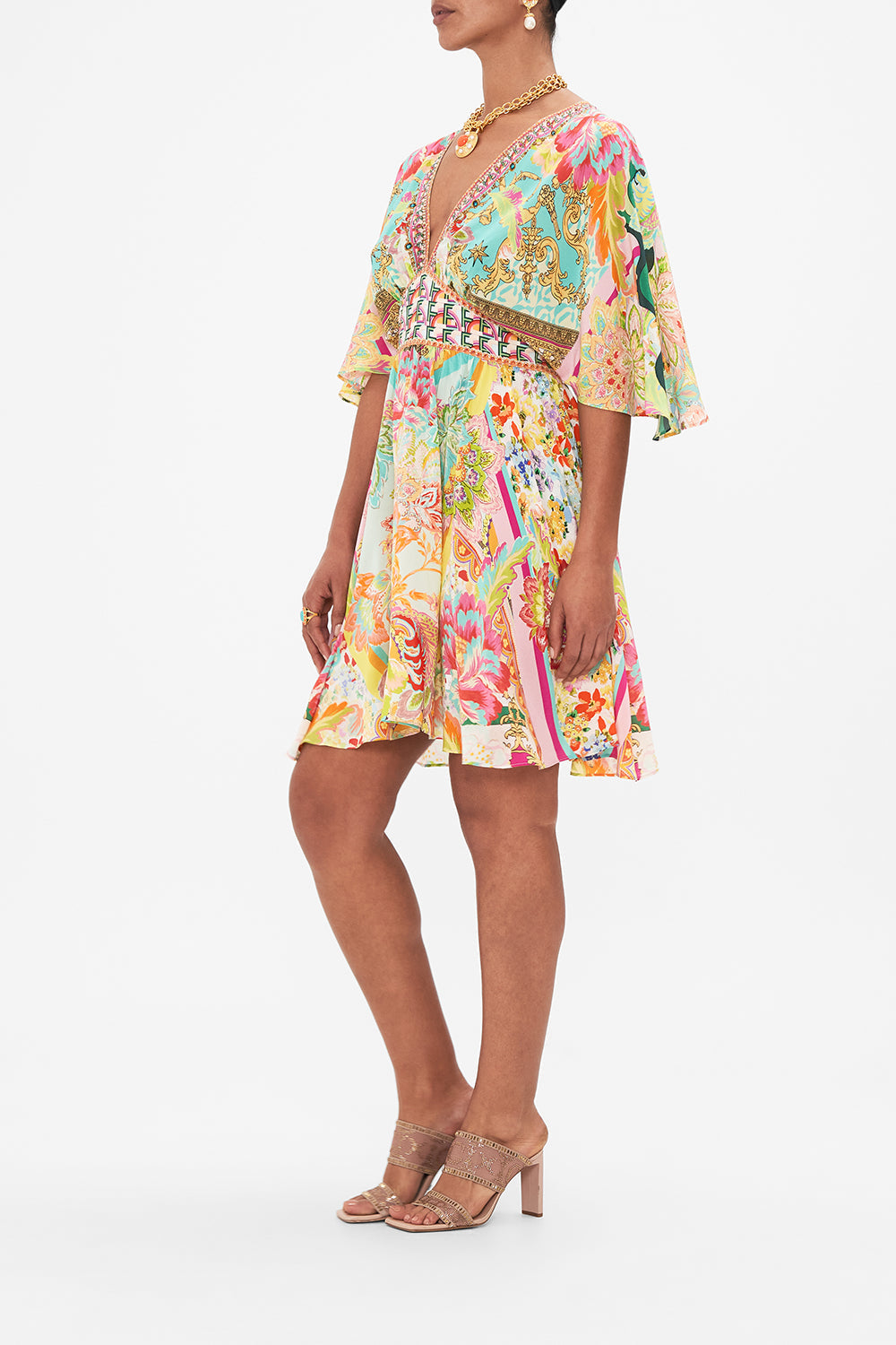 Side view of model wearing CAMILLA silk mini dress in An Italian Welcome print