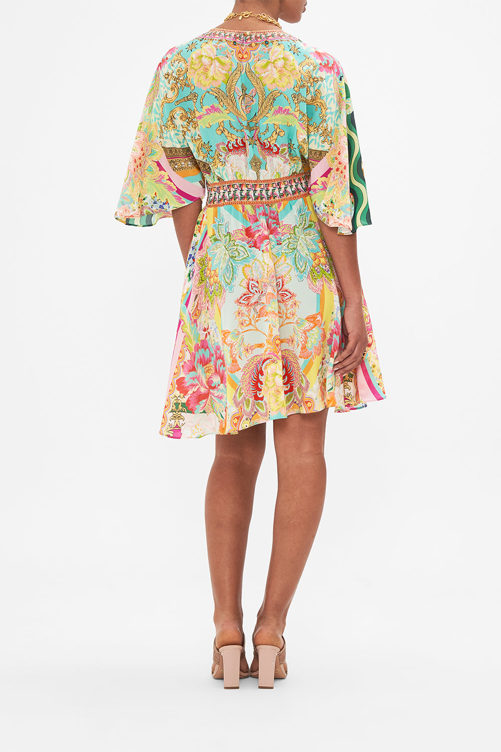 Back view of model wearing CAMILLA silk mini dress in An Italian Welcome print