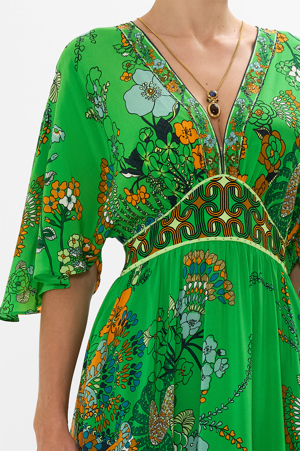 CAMILLA green waisted dress with hem ruffle in Good Vibes Generation print.