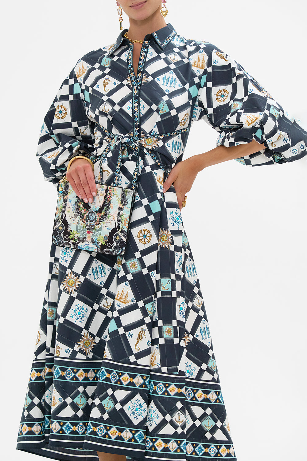 The CAMILLA Small Canvas Clutch in our Folk Afloat print.