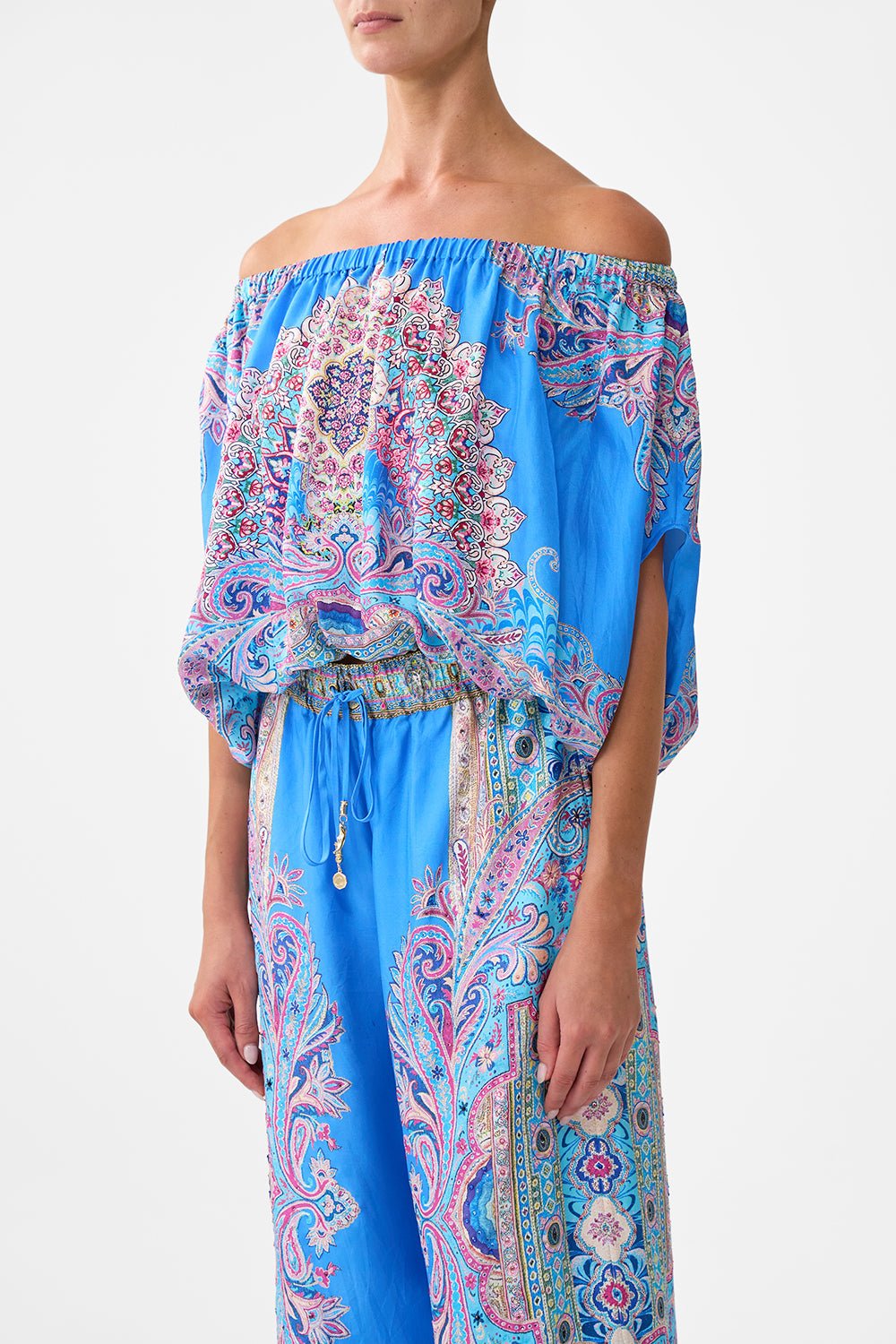 OFF SHOULDER ELASTIC TOP FOOTSTEPS IN FOLKLORE