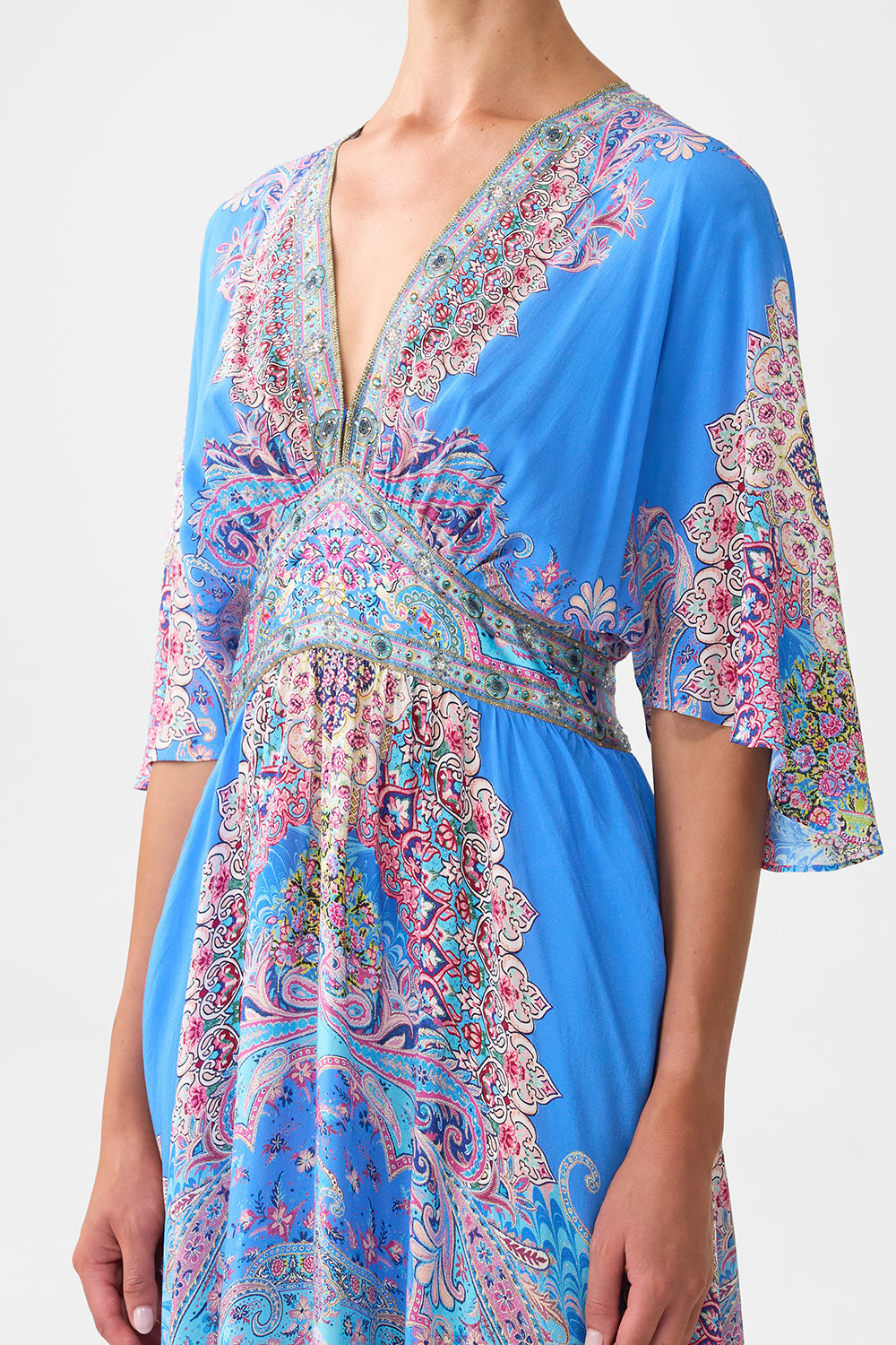 WAISTED DRESS WITH HEM RUFFLE FOOTSTEPS IN FOLKLORE