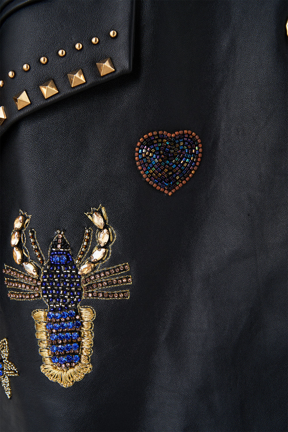 LEATHER JACKET WITH YOKE AMULETS AND ALCHEMY