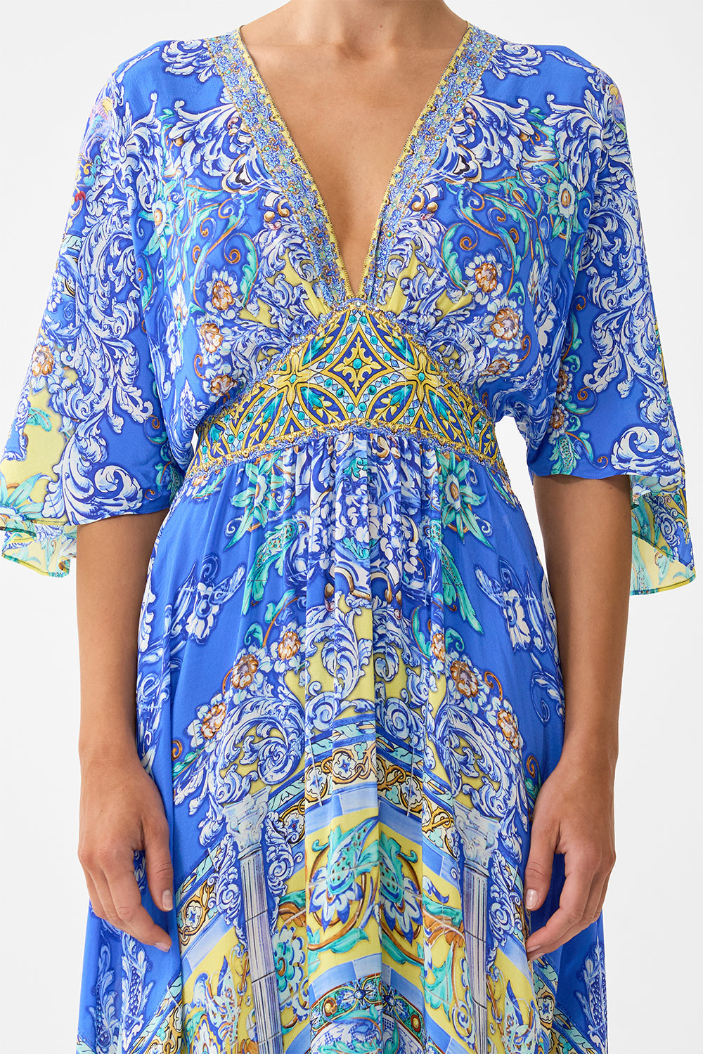 WAISTED DRESS WITH HEM RUFFLE BENEATH THE ANDALUSIAN SUN