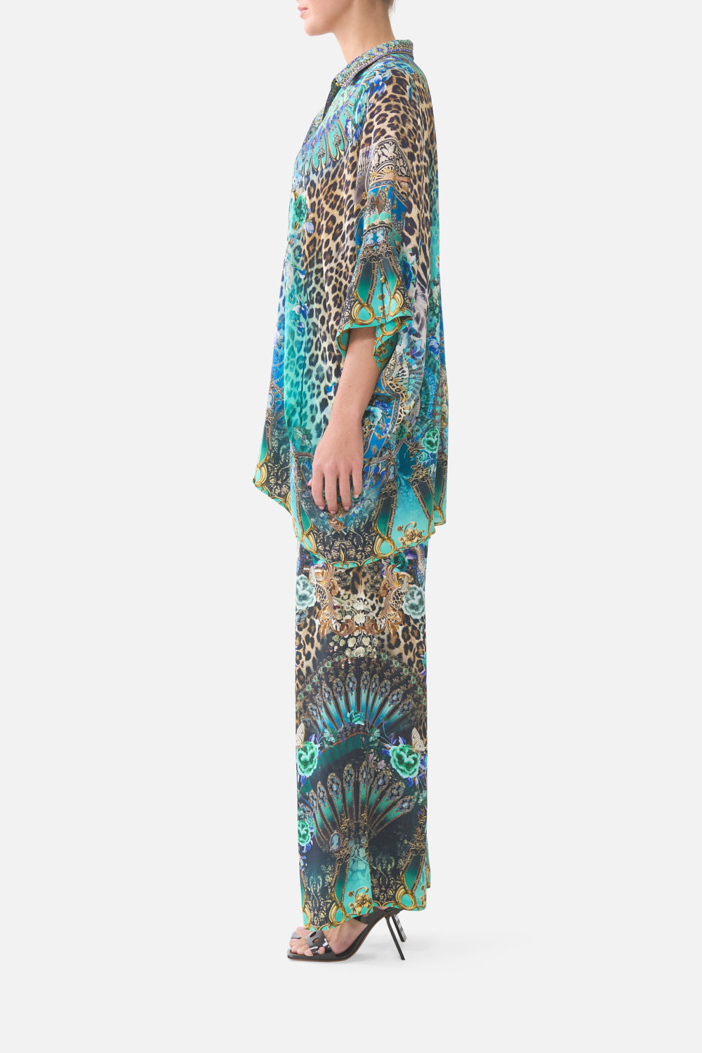 The CAMILLA MID LENGTH BOARDSHORT WITH ELASTIC WAIST CLOAKED IN BAROQUE in our print.