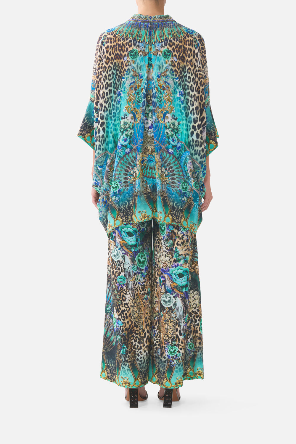 The CAMILLA MID LENGTH BOARDSHORT WITH ELASTIC WAIST CLOAKED IN BAROQUE in our print.