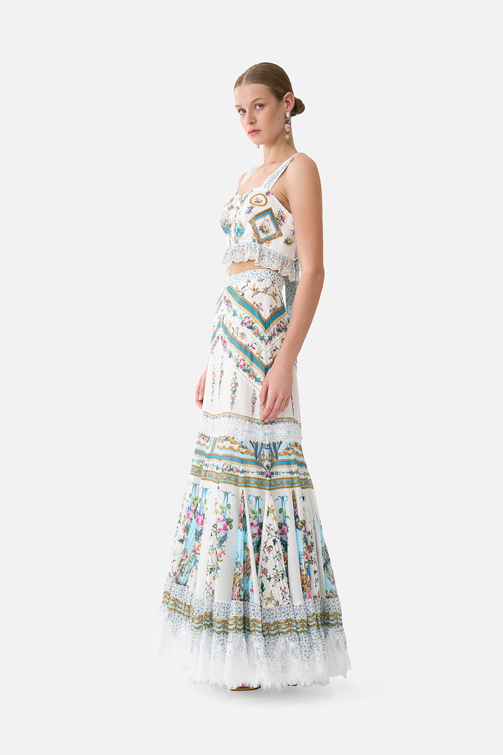 The CAMILLA RING SCARF CLUTCH DANDELION SKIES in our print.