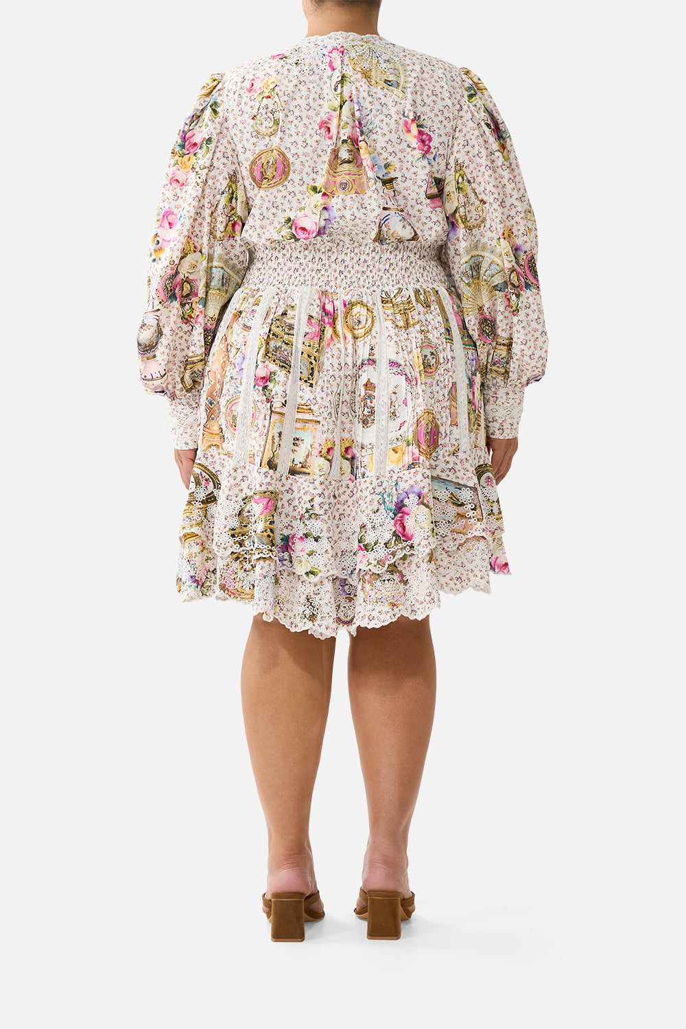 The CAMILLA JACKET WITH SLEEVE CUT OUT DETAIL ANIMALS IN THE PALACE in our print.