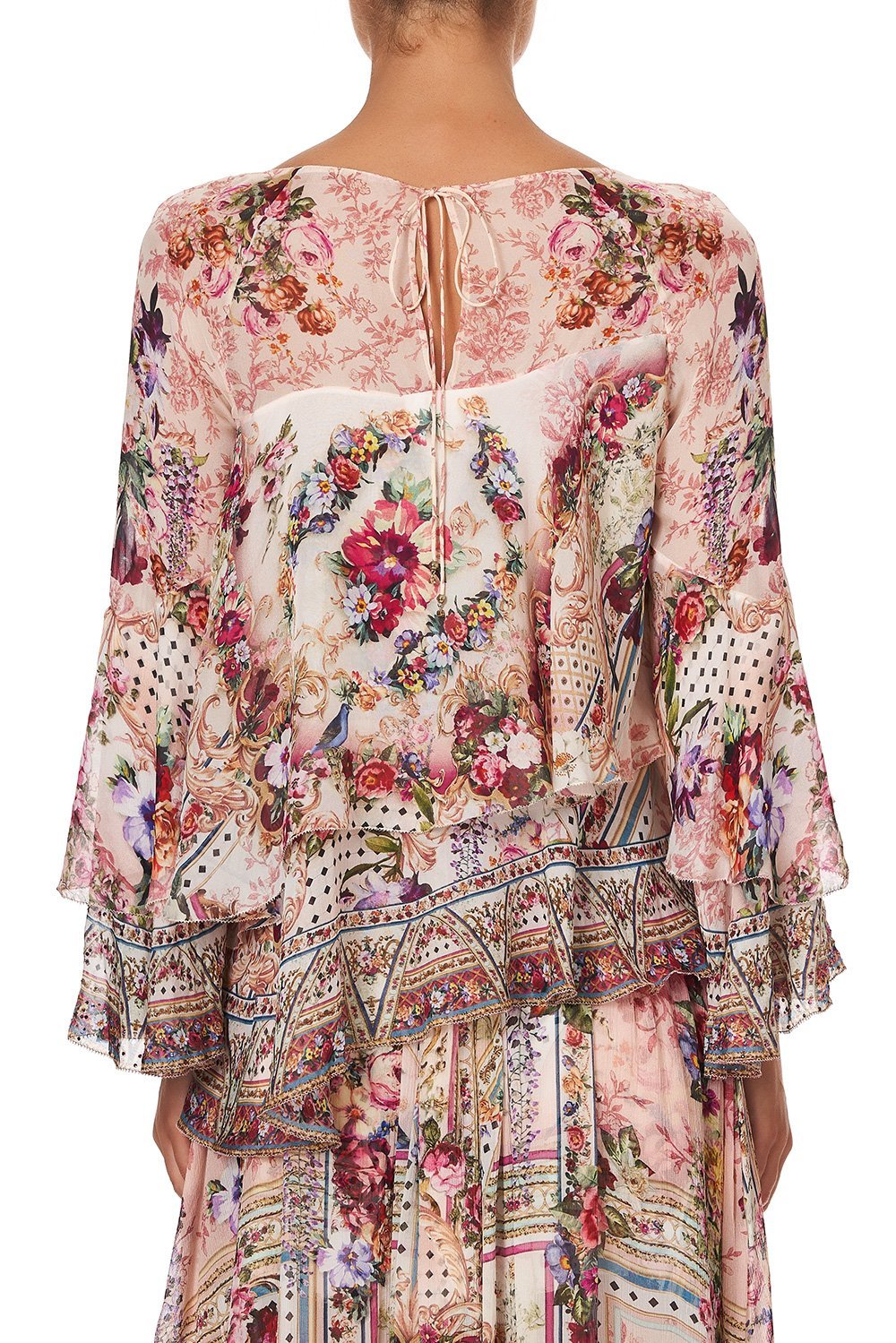 FLARED LAYERED BLOUSE SUMMONED BY A ROSE