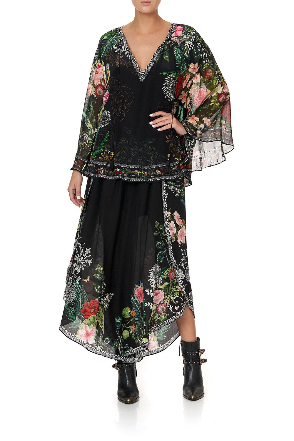 BLOUSE WITH CAPE SLEEVE RAISED WITH WOLVES