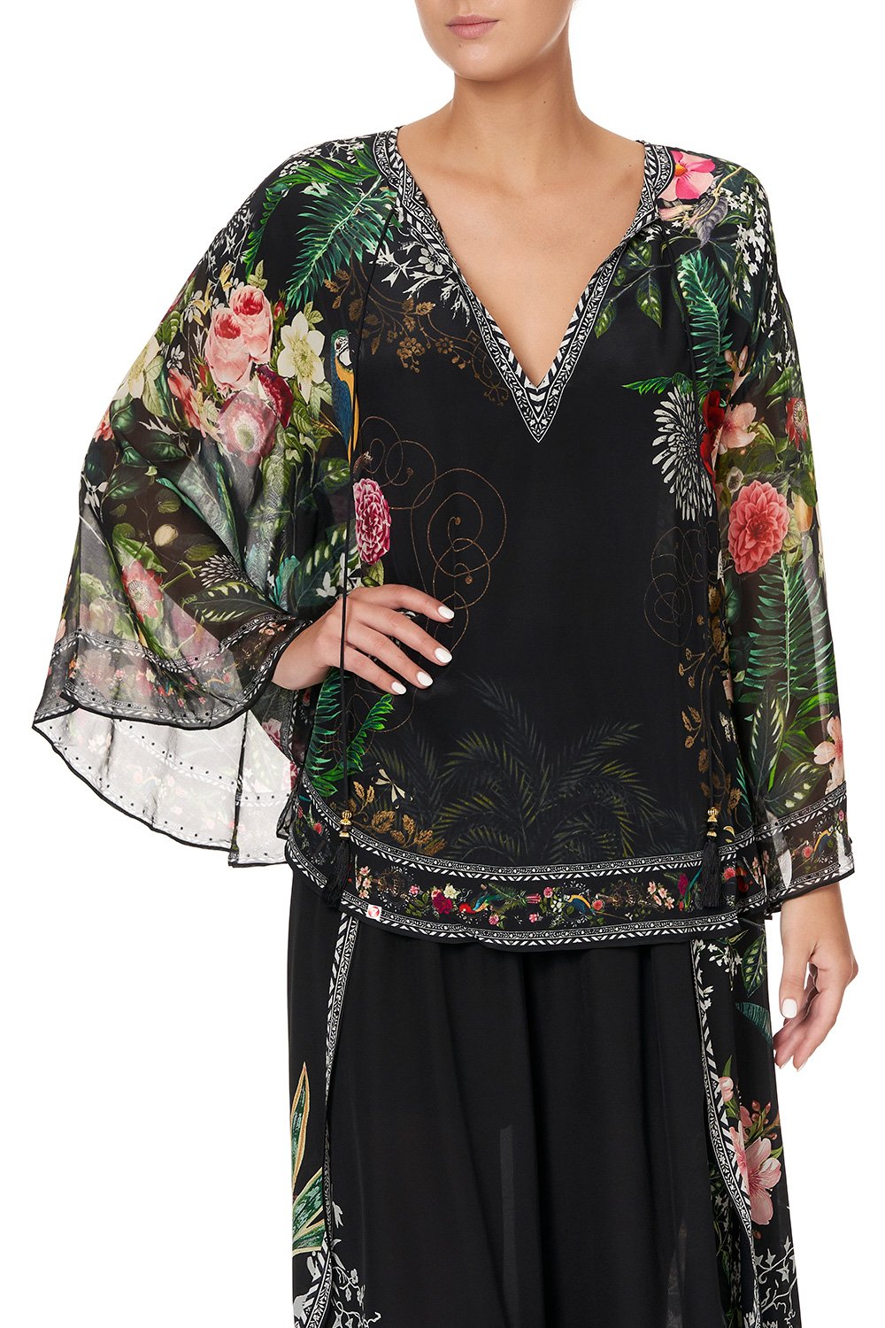 BLOUSE WITH CAPE SLEEVE RAISED WITH WOLVES