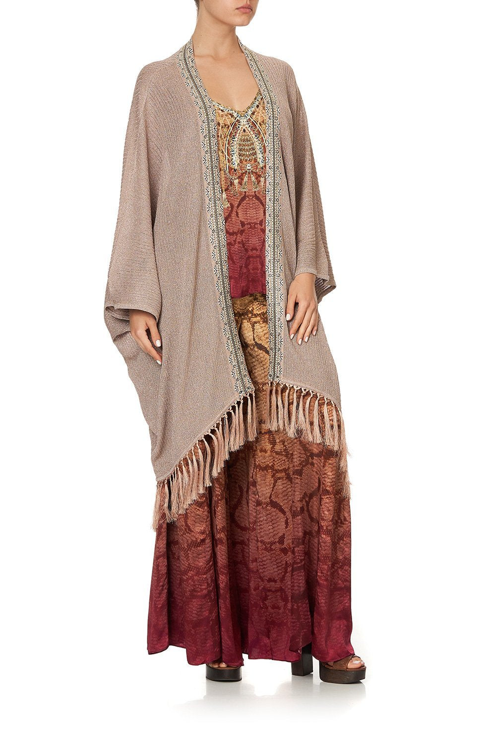 METALLIC KNIT PONCHO WITH TASSELS COASTAL TREASURE